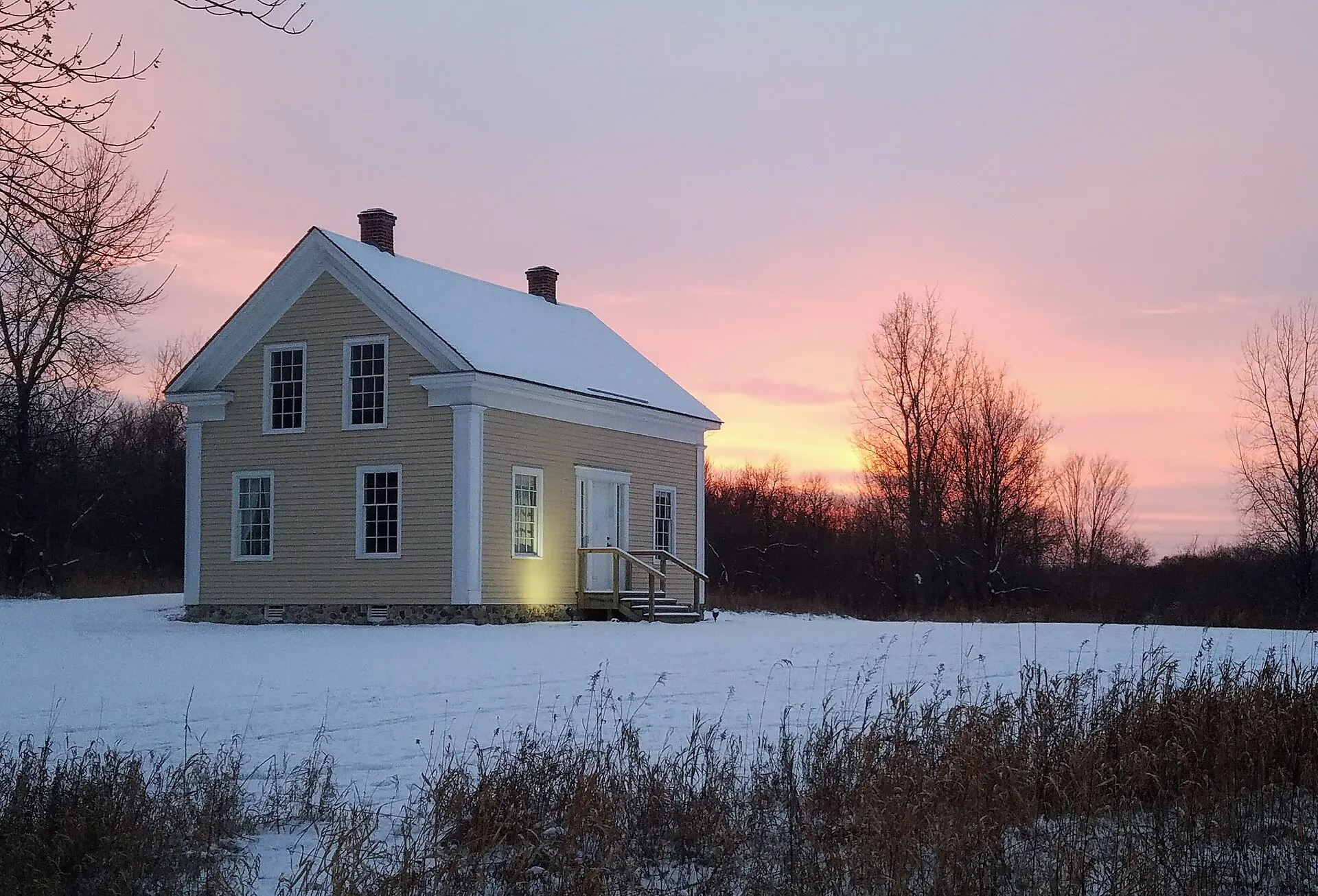 The Pierre Bottineau House at sunset in the snow, Elm Creek Park Reserve