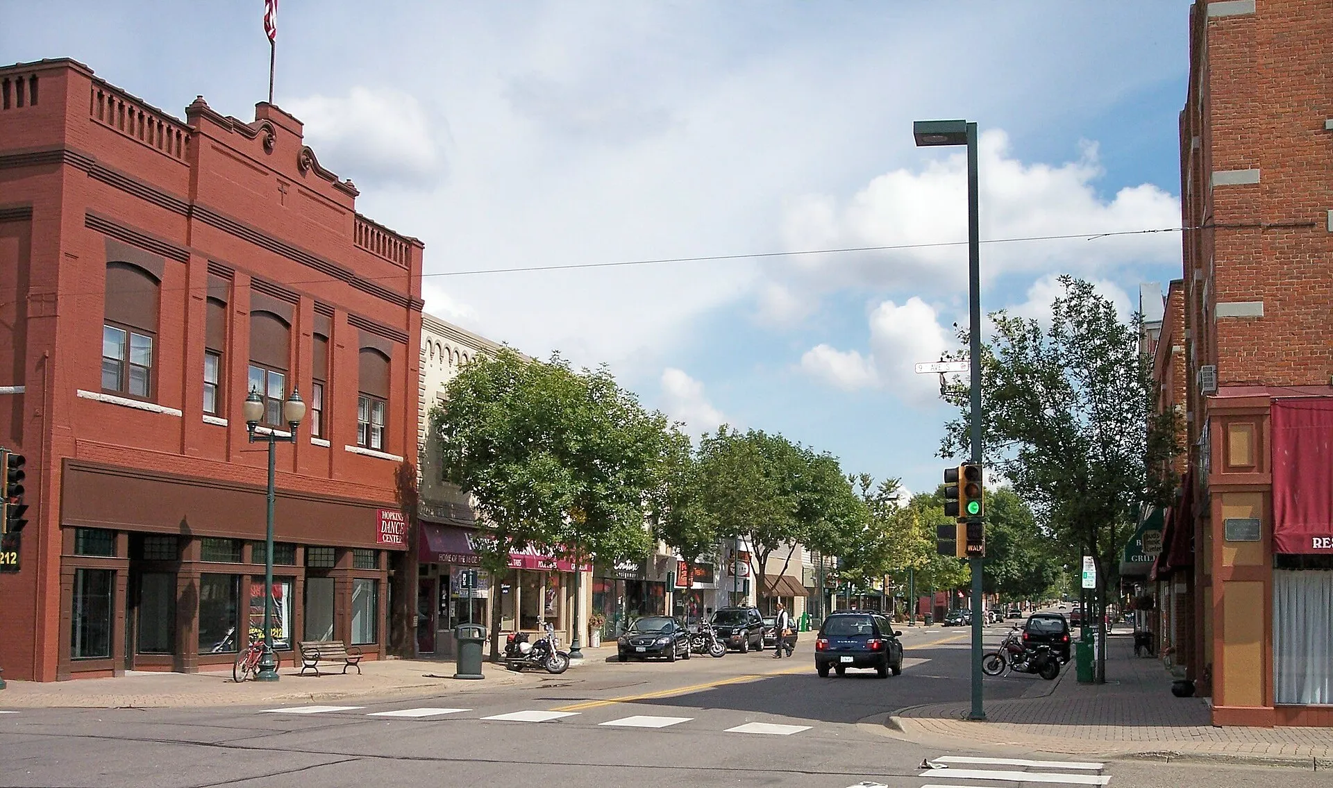 Historic brick storefronts along Mainstreet in downtown Hopkins