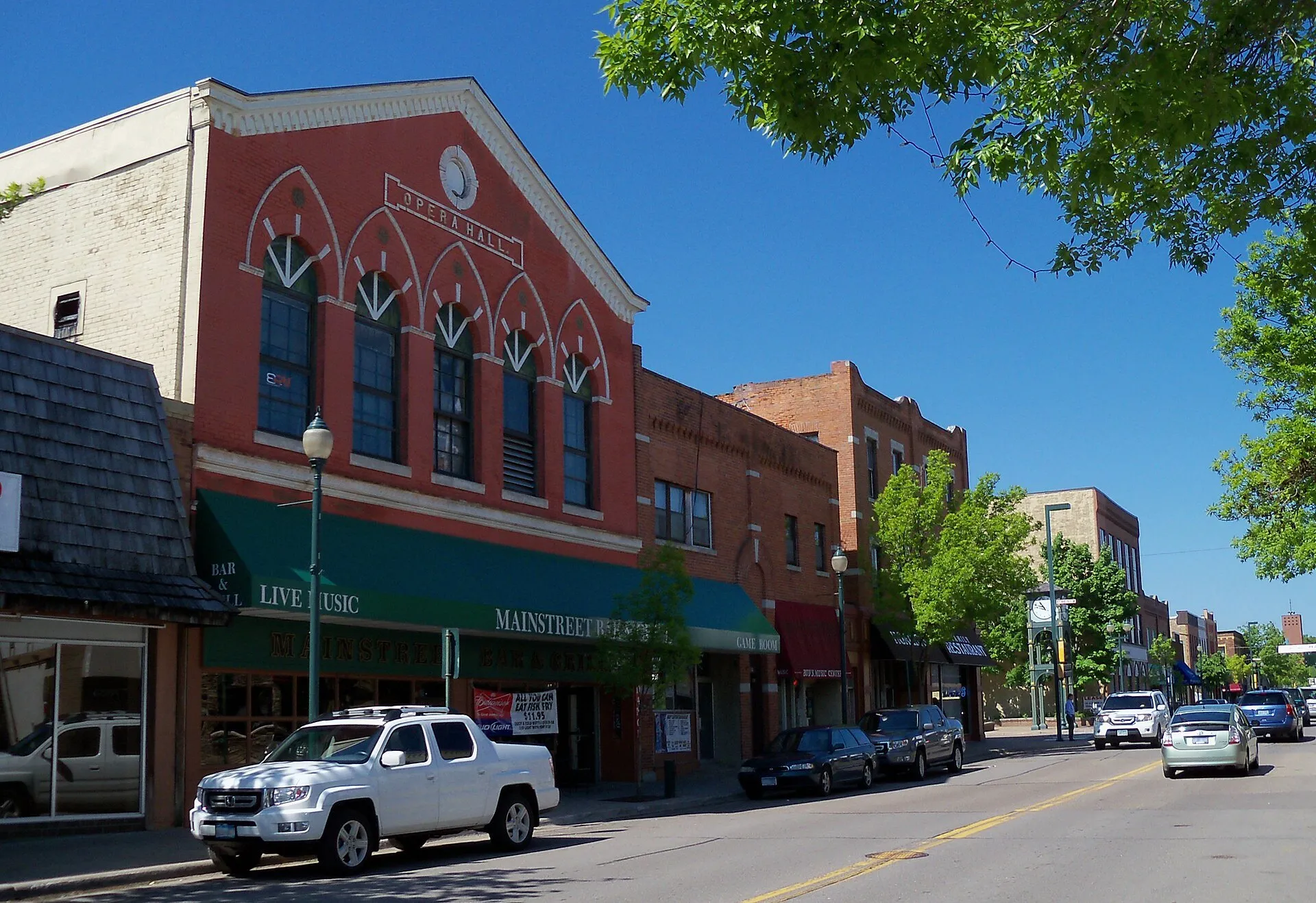 Shops and cafes on Mainstreet in Hopkins on a summer day