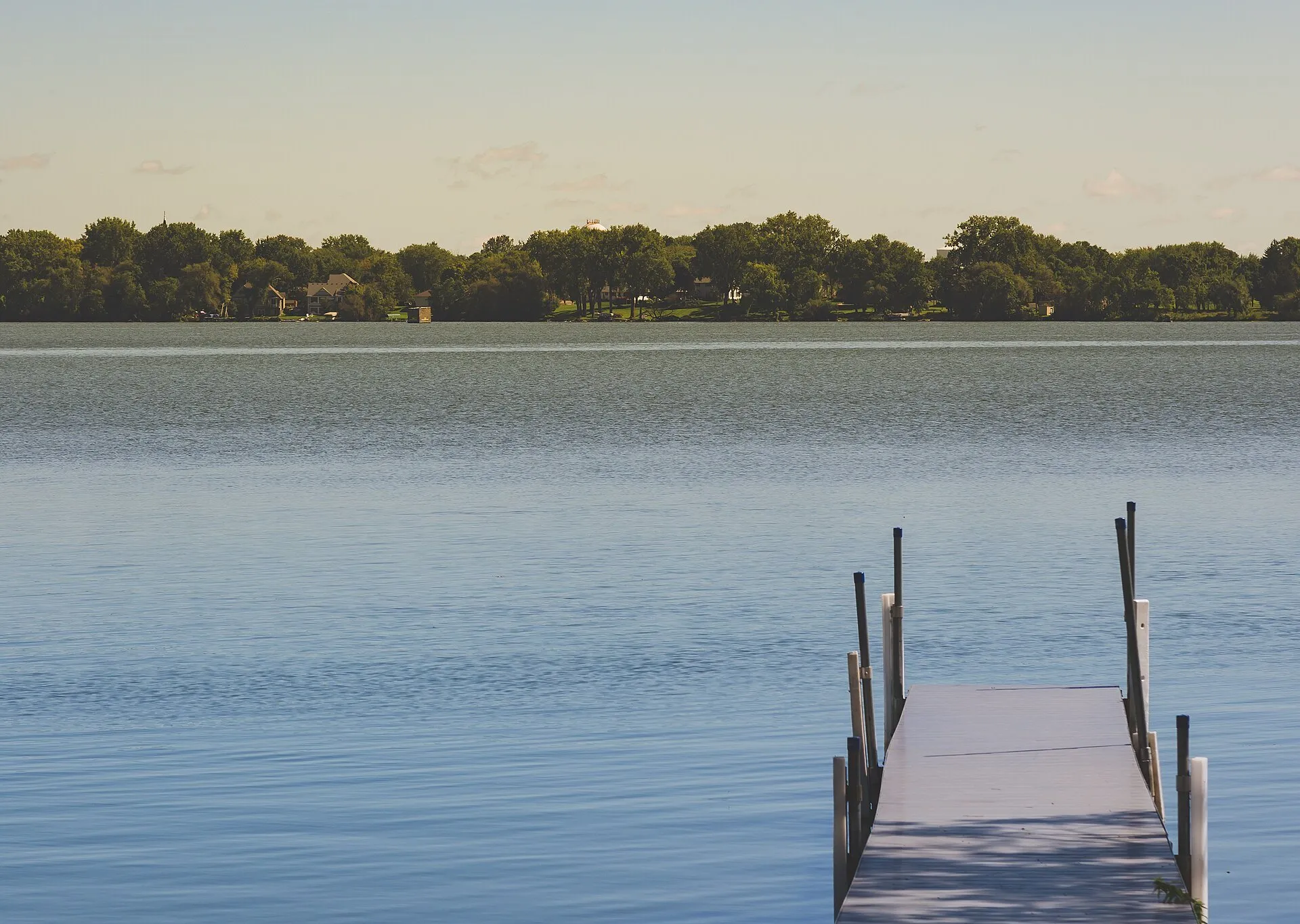 A dock on Centerville Lake in Lino Lakes on a calm summer evening