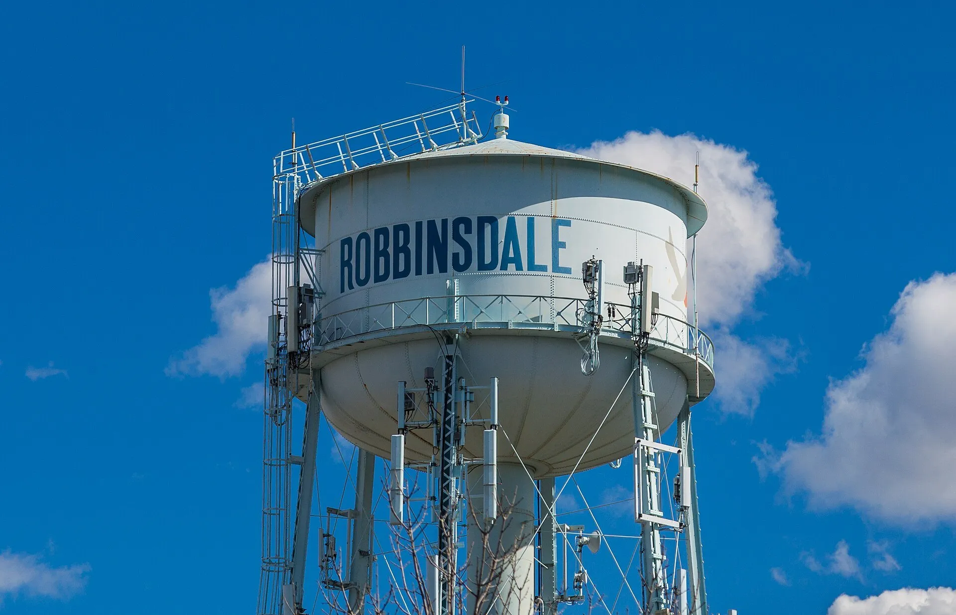 The Robbinsdale water tower against a blue sky