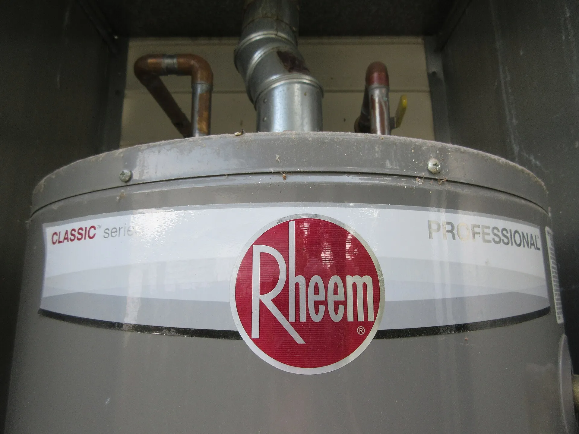 A residential gas water heater tank